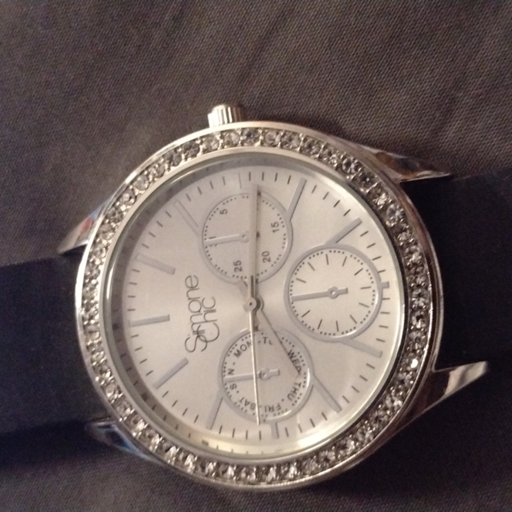 Womens Watch diamonds around watch face black band silver clasp